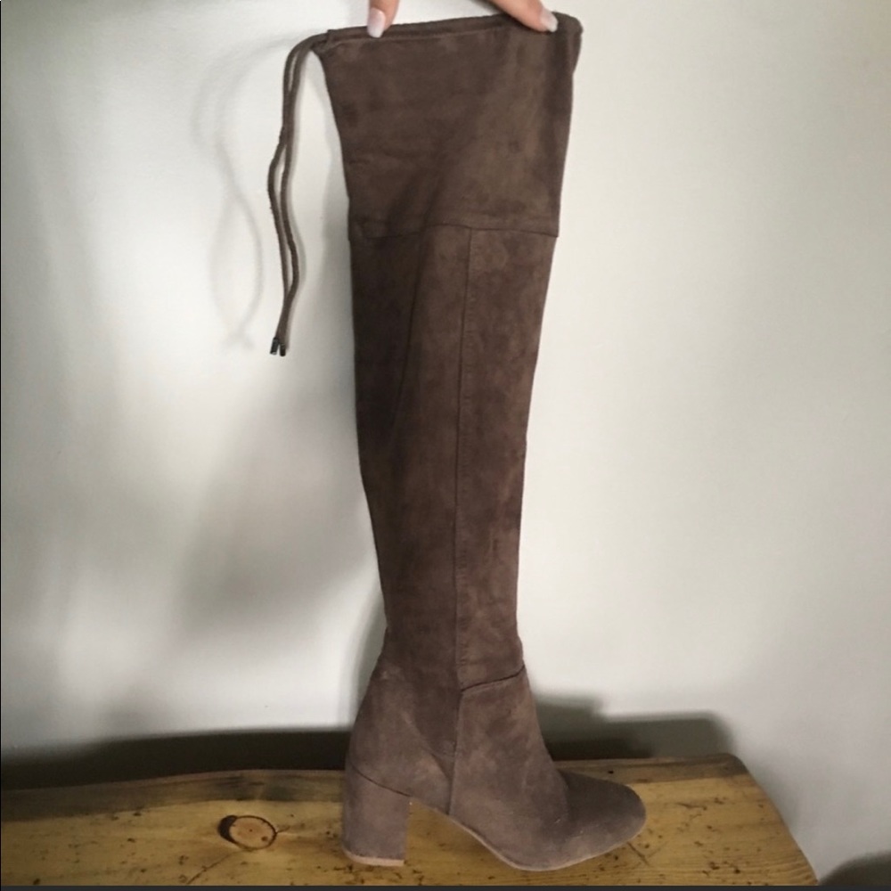 Brown suede knee high heeled boots